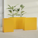 Amesbury Narrow Rectangular fiberglass planter in Gloss Saffron, size range, in a sunlit interior