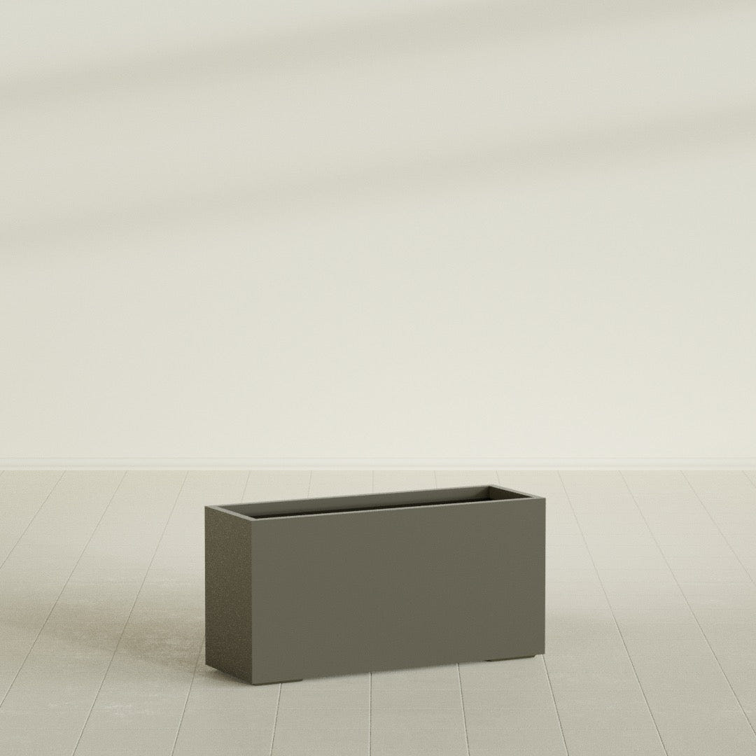 Tolga Rectangular Planter in Matte Bronze, 48"L × 16"D × 24"H, shown empty