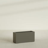 Tolga Rectangular Planter in Matte Bronze, 48"L × 16"D × 24"H, shown empty