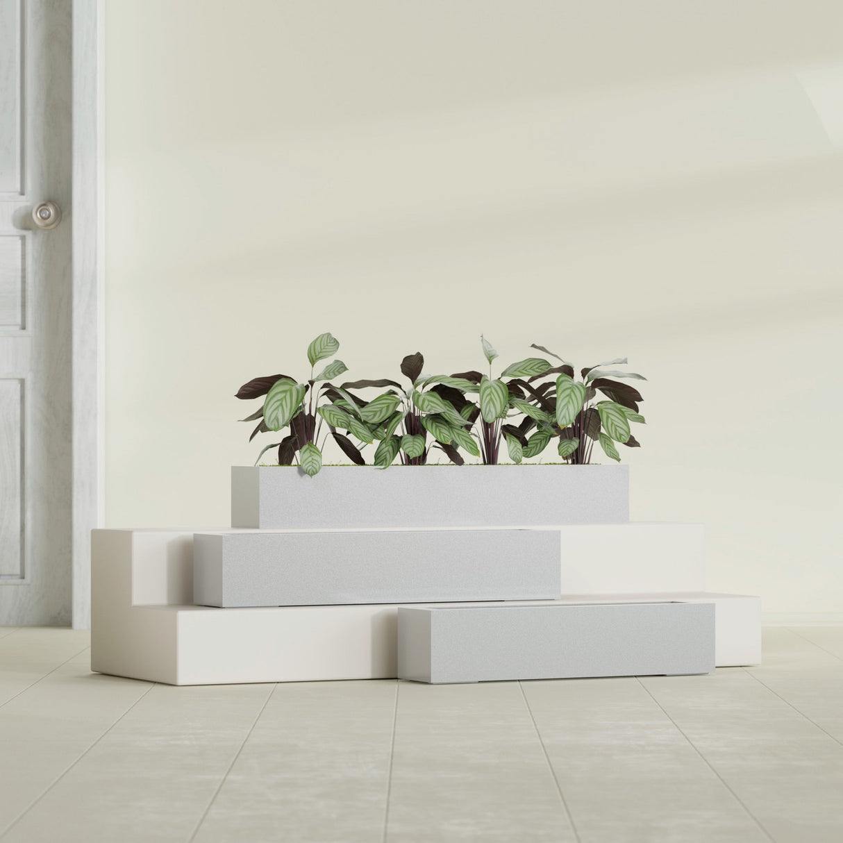 Salon Box fiberglass planter in Metallic Silver, size range, in a sunlit interior