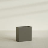 Milano Narrow Rectangular Planter in Matte Bronze, 24"L × 10"D × 24"H, shown empty