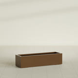 Cuba Low Rectangular Planter in Metallic Bronze, 48"L × 14"D × 12"H, shown empty