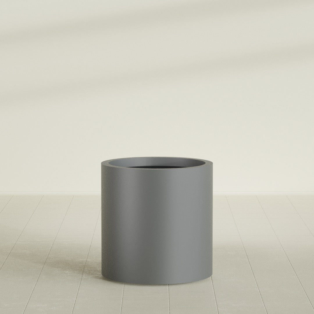 Rio Grande Cylinder Planter in Matte Gunmetal, 22"D × 22"H, shown empty