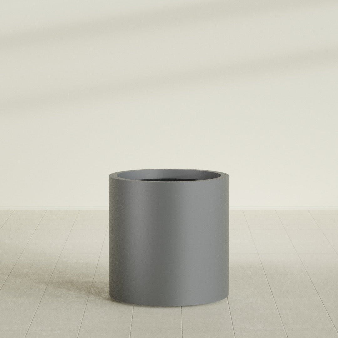 Rio Grande Cylinder Planter in Matte Gunmetal, 22"D × 22"H, shown empty