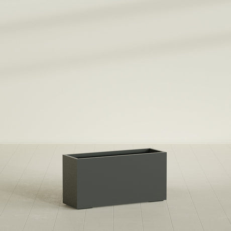 Tolga Rectangular Planter in Matte Charcoal, 48"L × 16"D × 24"H, shown empty