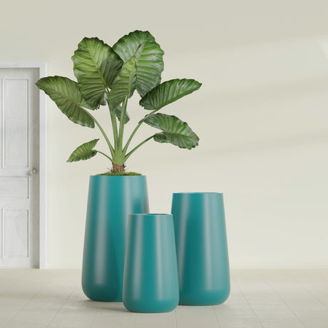 Saigon Tapered Round fiberglass planter in Satin Seafoam Green, size range, in a sunlit interior
