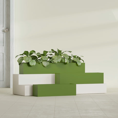 Monaco Rectangle fiberglass planter in Satin Green, shown planted, in a sunlit interior