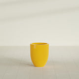 Valencia Tapered Round Planter in Gloss Saffron, 15"D × 18"H, shown empty