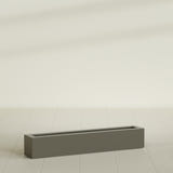 Salon Box Planter in Matte Bronze, 48" Long, shown empty