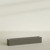 Salon Box Planter in Matte Bronze, 48" Long, shown empty