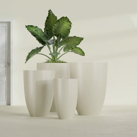 Brannan Tapered Round fiberglass planter in Satin Beige, size range, in a sunlit interior