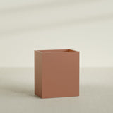 Darwin Rectangular Planter in Matte Terra Cotta, 36"L × 24"D × 42"H, shown empty