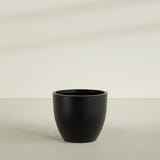Wannsee Round Planter in Matte Black, 39"D × 34"H, shown empty