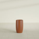 Lisbon tall round tapered fiberglass planter in Matte Terra Cotta, 14 in diameter, 25 in high, shown empty