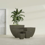 Lima Tapered Square fiberglass planter in Matte Bronze, size range, in a sunlit interior