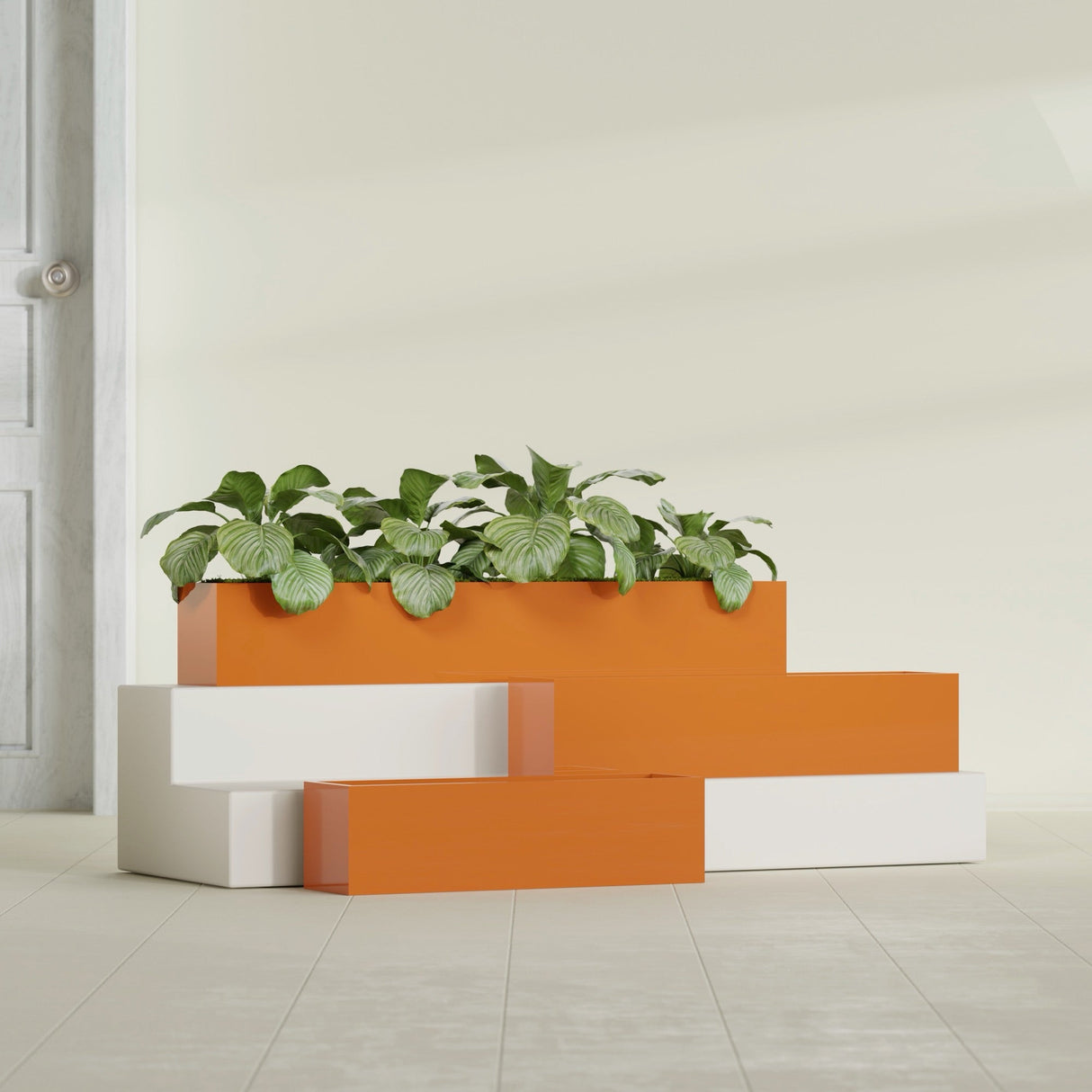 Monaco Rectangle fiberglass planter in Gloss Tangerine, shown planted, in a sunlit interior