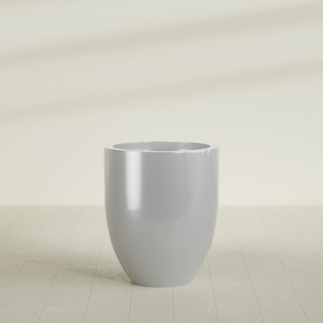 Valencia Tapered Round Planter in Metallic Silver, 27"D × 31"H, shown empty