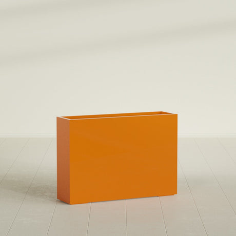 Perth Rectangular Planter in Gloss Tangerine, 60"L × 16"D × 42"H, shown empty