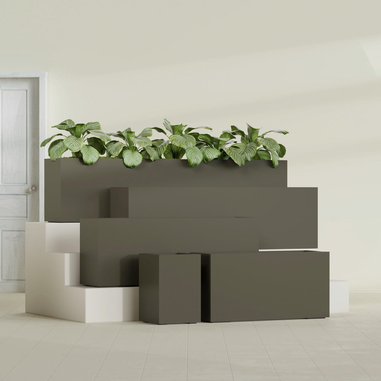 Miami Narrow Rectangular fiberglass planter in Matte Bronze, size range, in a sunlit interior