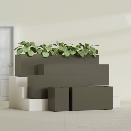 Miami Narrow Rectangular fiberglass planter in Matte Bronze, size range, in a sunlit interior