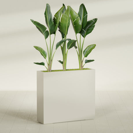Amesbury Narrow Rectangular fiberglass planter in Satin Beige, shown planted, in a sunlit interior