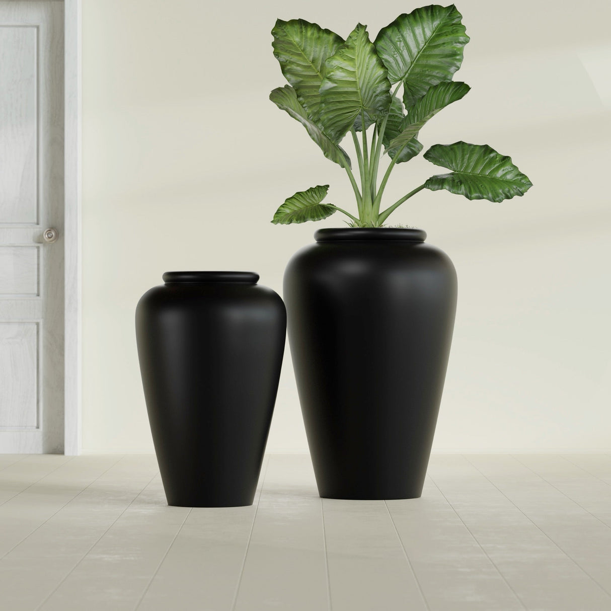 Barà Jar fiberglass planter in Matte Black, size range, in a sunlit interior