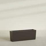 Panama Tapered Rectangular Planter in Matte Dark Brown, 48"L × 12"D × 18"H, shown empty