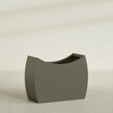 Seoul Curved Planter in Matte Bronze, 48"L × 20"D × 36"H, shown empty