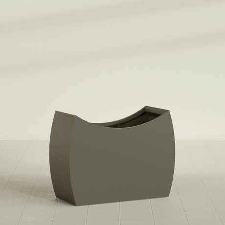 Seoul Curved Planter in Matte Bronze, 48"L × 20"D × 36"H, shown empty