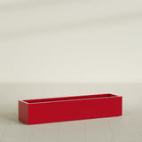 Cuba Low Rectangular Planter in Gloss Red, 60"L × 14"D × 12"H, shown empty