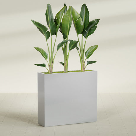 Amesbury Narrow Rectangular fiberglass planter in Metallic Silver, shown planted, in a sunlit interior