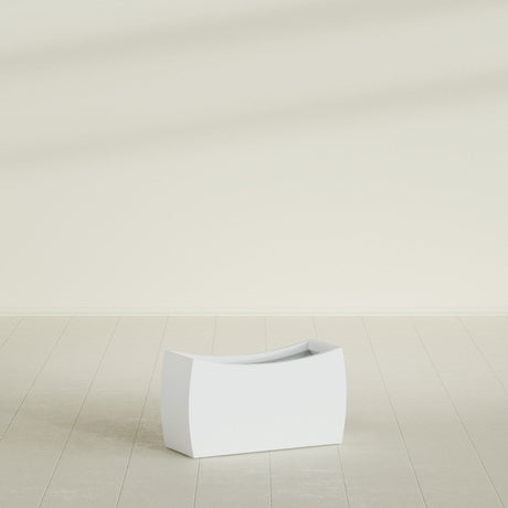 Seoul Curved Planter in Matte Bright White, 32"L × 12"D × 18"H, shown empty