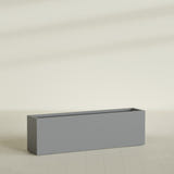Miami Narrow Rectangular Planter in Matte Gunmetal, 60"L × 12"D × 18"H, shown empty