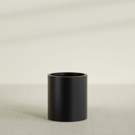 Rio Grande Cylinder Planter in Matte Black, 18"D × 20"H, shown empty