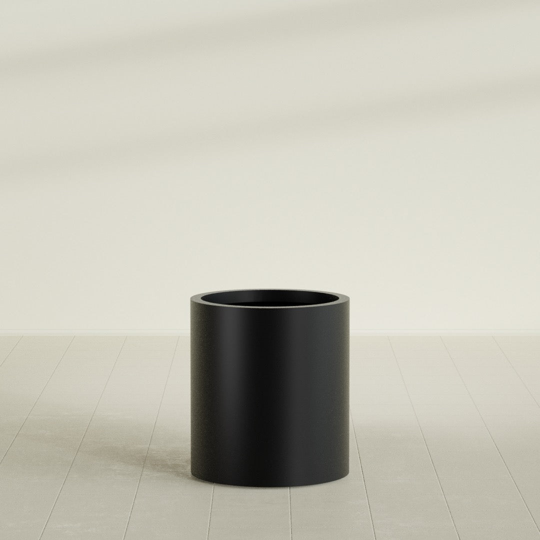 Rio Grande Cylinder Planter in Matte Black, 18"D × 20"H, shown empty