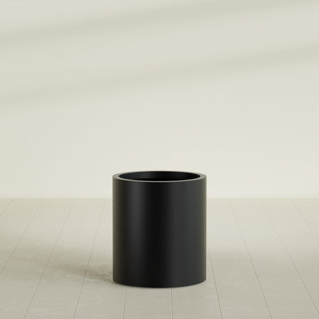 Rio Grande Cylinder Planter in Matte Black, 18"D × 20"H, shown empty