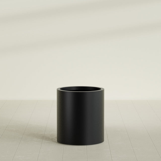 Rio Grande Cylinder Planter in Matte Black, 18"D × 20"H, shown empty
