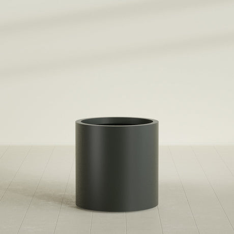 Rio Grande Cylinder Planter in Matte Charcoal, 22"D × 22"H, shown empty