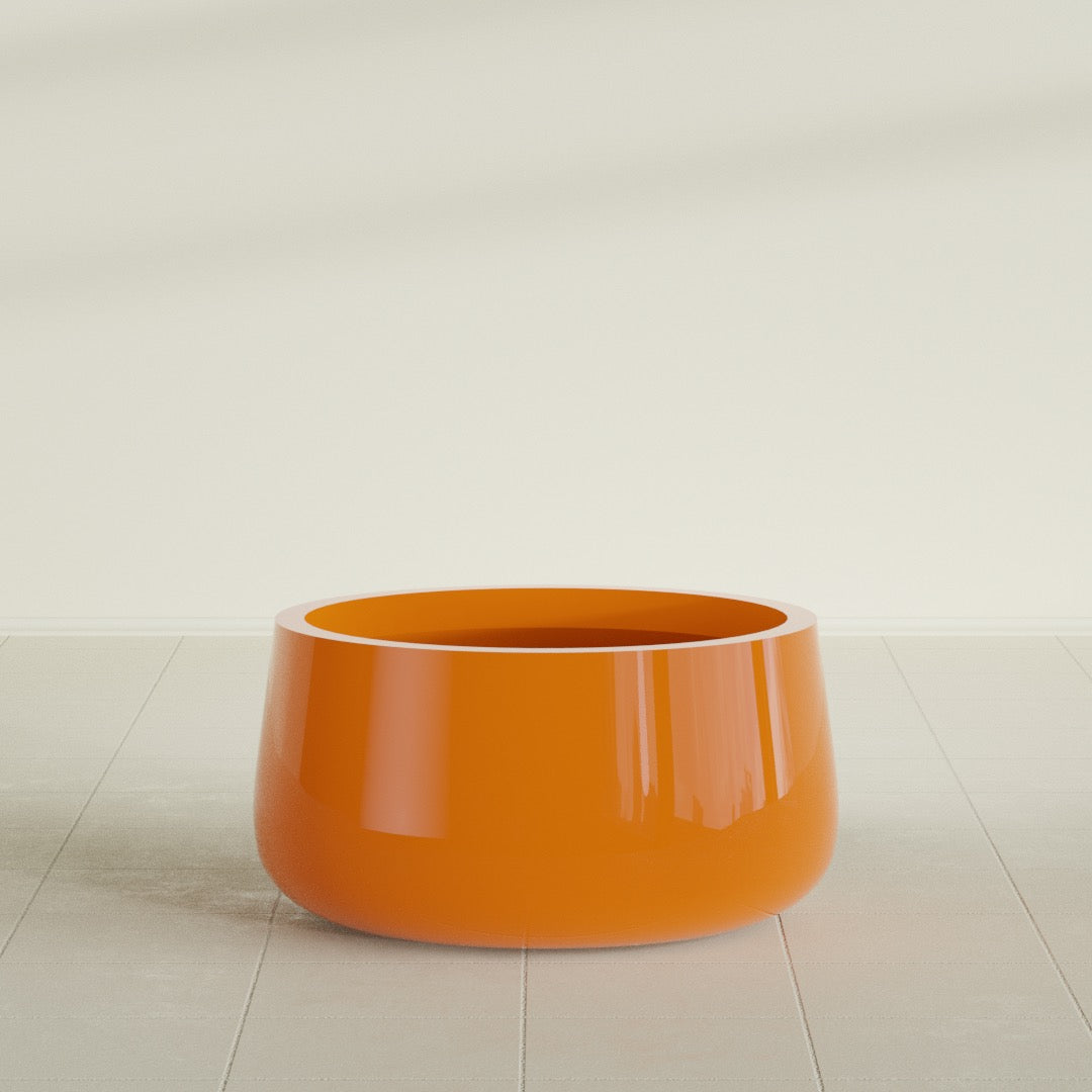 Short Hayden Bowl Planter in Gloss Tangerine, 20"D × 10"H, shown empty