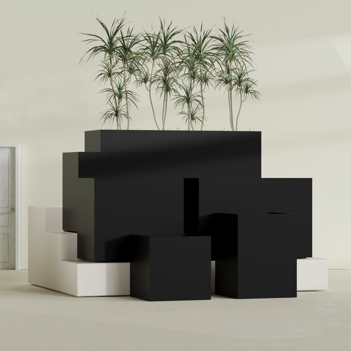 Brisbane Corner fiberglass planter in Matte Black, size range, in a sunlit interior