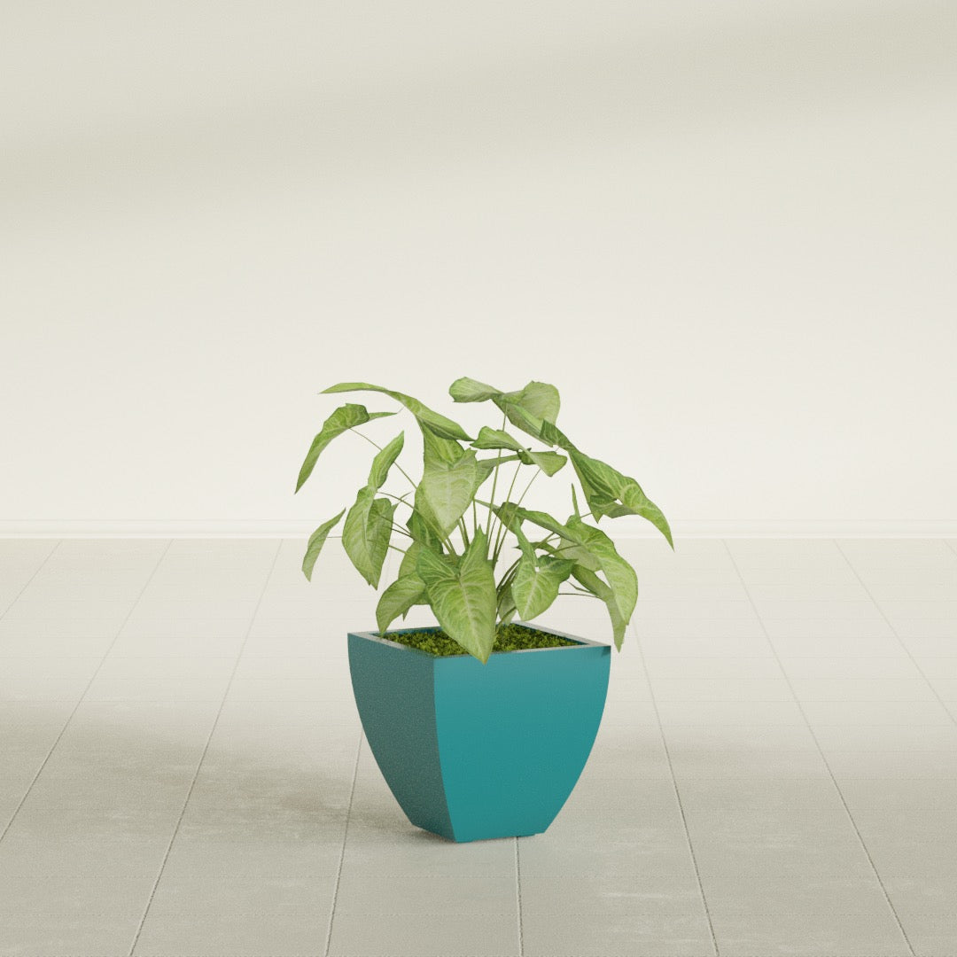 Lima Tapered Square fiberglass planter in Satin Seafoam Green, shown planted, in a sunlit interior