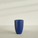 Brannan Tapered Round Planter in Matte Cobalt Blue, 24"D × 35"H, shown empty