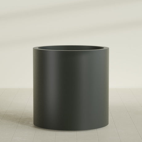 Rio Grande Cylinder Planter in Matte Charcoal, 30"D × 32"H, shown empty