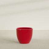 Wannsee Round Planter in Gloss Red, 39"D × 34"H, shown empty