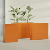 Amesbury Narrow Rectangular fiberglass planter in Gloss Tangerine, size range, in a sunlit interior