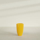 Brannan Tapered Round Planter in Gloss Saffron, 18"D × 29"H, shown empty