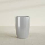 Lisbon tall round tapered fiberglass planter in Metallic Silver, 24 in diameter, 36 in high, shown empty