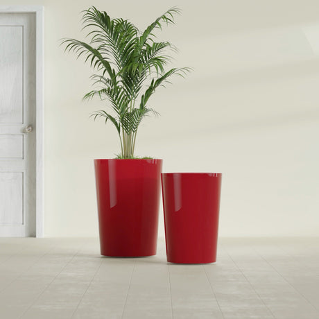 Tegel Round Tapered fiberglass planter in Gloss Red, size range, in a sunlit interior