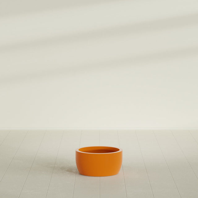 Casablanca Bowl Planter in Gloss Tangerine, 20"D × 10"H, shown empty