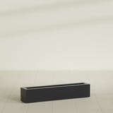 Salon Box Planter in Matte Black, 42" Long, shown empty